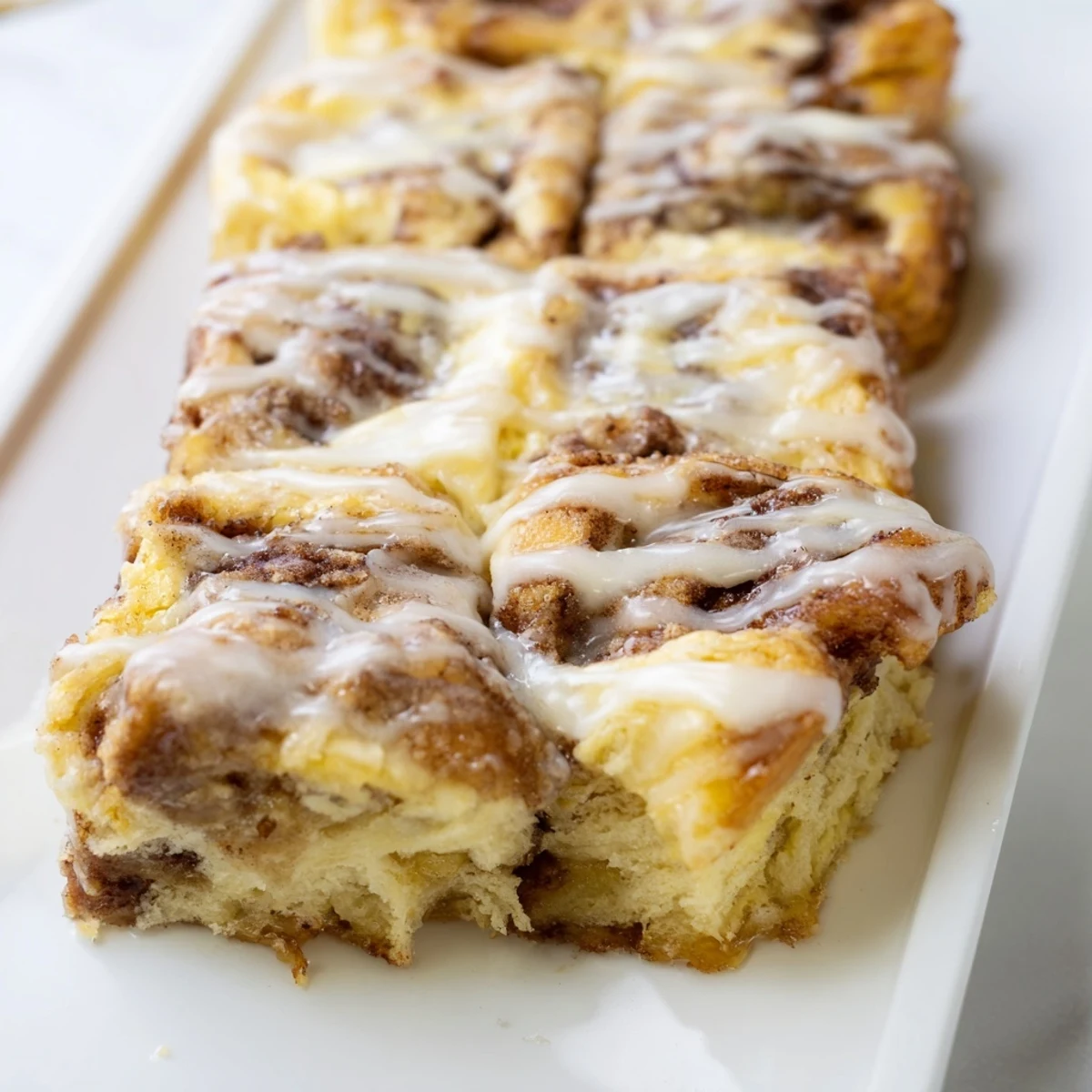 A bubbling cinnamon roll casserole with a creamy custard base, perfect for a cozy weekend breakfast.