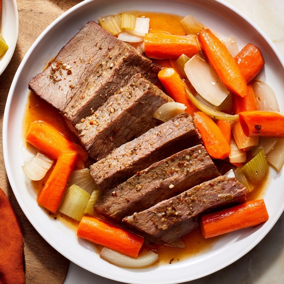 A close-up of a beautifully browned beef brisket, ready for slicing and enjoying its flavors.