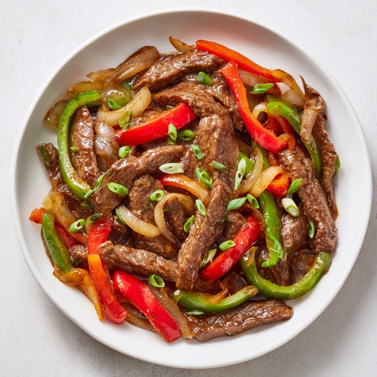A flavorful Pepper Steak meal, featuring tender beef and colorful bell peppers, ideal for a quick dinner.