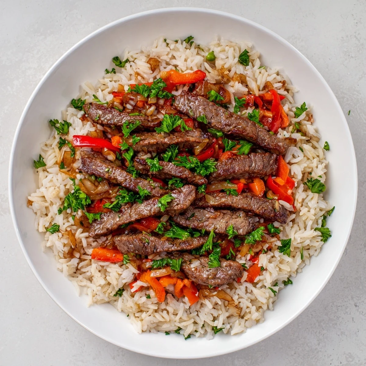 Delicious Beef and Rice Skillet, garnished with fresh parsley, ready to serve and enjoy.