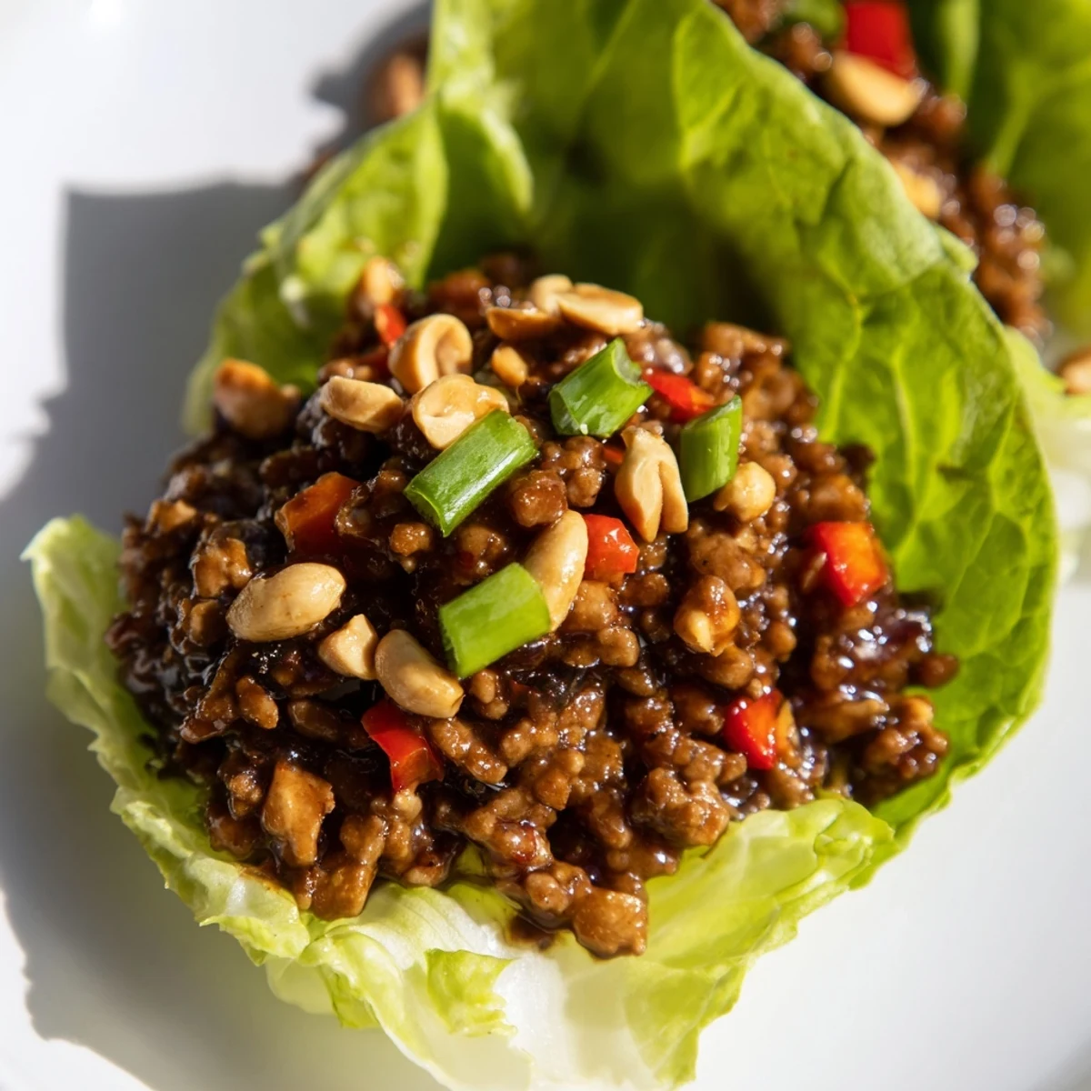 Sizzling aromatic ginger and garlic ground beef, tossed in a glossy hoisin sauce. Ready to spoon into vibrant Beef Lettuce Wraps with Hoisin Sauce for dinner.