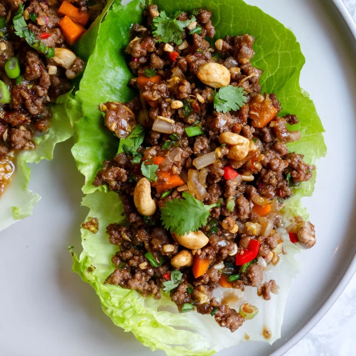 Crisp butter lettuce cups filled with savory beef and cashew stir-fry