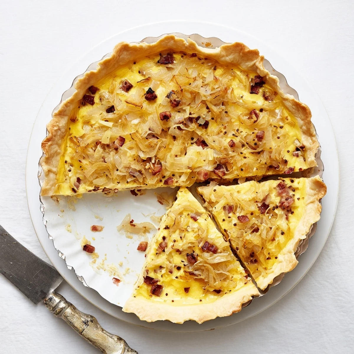 Homemade German onion pie baked to perfection with crisp crust and tender onion filling