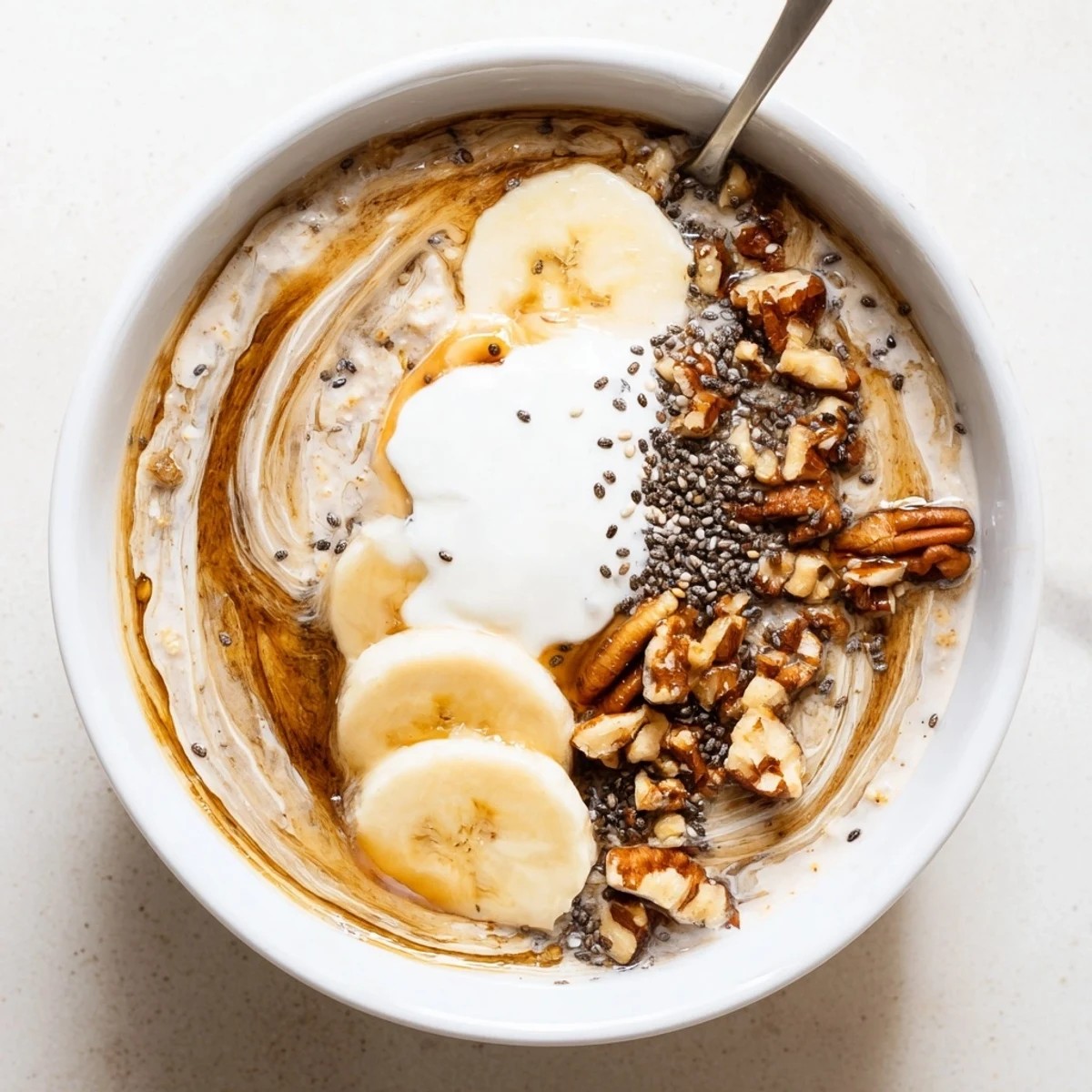 Jar of Brown Sugar Coffee Overnight Oats, chilled and coffee-scented for breakfast