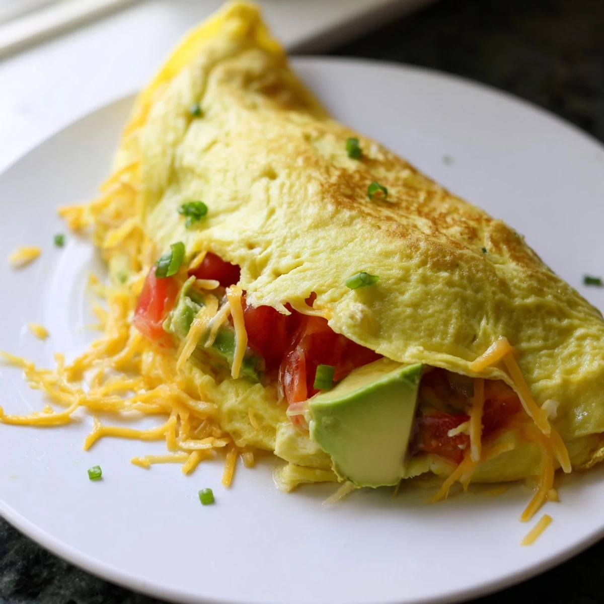 Avocado Cheesy Tomato Omelette